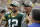 Green Bay Packers' Aaron Rodgers smiles with former quarterback Brett Favre during halftime of an NFL football game against the Minnesota Vikings Sunday, Sept. 15, 2019, in Green Bay, Wis. (AP Photo/Mike Roemer)