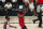 Houston Rockets guard James Harden (13) shoots a layup over Philadelphia 76ers center Joel Embiid (21) during the second half of an NBA basketball game Friday, Aug. 14, 2020, in Lake Buena Vista, Fla. (Kim Klement/Pool Photo via AP)