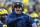FILE  - In this Nov. 30, 2019, file photo, Michigan head coach Jim Harbaugh calls a timeout in the third quarter of an NCAA college football game against Ohio State in Ann Arbor, Mich. Michigan has been good, not great, under coach Jim Harbaugh. Harbaugh's sixth season in charge of college football's winningest program, which he starred for as a quarterback three-plus decades ago, is expected to follow the pattern. (AP Photo/Tony Ding, File)