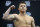 Canelo Alvarez stands on the scale during a weigh-in Friday, Nov. 1, 2019, in Las Vegas for his boxing bout against Sergey Kovalev for the WBO light heavyweight title Saturday. (AP Photo/John Locher)
