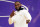 Los Angeles Lakers forward LeBron James reacts after receiving his NBA championship ring before an NBA basketball game against the Los Angeles Clippers, Tuesday, Dec. 22, 2020, in Los Angeles. (AP Photo/Marcio Jose Sanchez)