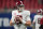 Alabama quarterback Mac Jones (10) warms up before the first half of the Southeastern Conference championship NCAA college football game against Florida, Saturday, Dec. 19, 2020, in Atlanta. (AP Photo/Brynn Anderson)