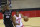 Houston Rockets' Eric Gordon (10) controls the ball around defender San Antonio Spurs' Rudy Gay (22) during the first quarter of an NBA basketball game in Houston, Thursday, Dec. 17, 2020. (Carmen Mandato/Pool Photo via AP)