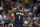 FILE - In this March 6, 2020, file photo, New Orleans Pelicans forward Zion Williamson walks onto the court during the second half of the team's NBA basketball game against the Miami Heat in New Orleans. A Florida appeals court has granted Williamson’s motion to block his former marketing agent’s effort to have the ex-Duke star answer questions about whether he received improper benefits before playing for the Blue Devils. The order Wednesday shifts the focus to separate but related case between the same litigants in federal court in North Carolina. (AP Photo/Rusty Costanza, File)
