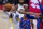 Golden State Warriors guard Jordan Poole (3) makes a layup as Detroit Pistons guard Saddiq Bey (41) defends during the first half of an NBA basketball game Tuesday, Dec. 29, 2020, in Detroit. (AP Photo/Carlos Osorio)