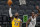 Los Angeles Lakers forward LeBron James (23) scores past San Antonio Spurs guard DeMar DeRozan (10) during the first half of an NBA basketball game in San Antonio, Wednesday, Dec. 30, 2020. (AP Photo/Eric Gay)