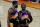 Phoenix Suns forward Mikal Bridges (25) and Chris Paul (3) during the first half of an NBA basketball game against the New Orleans Pelicans, Tuesday, Dec. 29, 2020, in Phoenix. (AP Photo/Rick Scuteri)