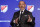 FILE - In this Feb. 26, 2020, file photo, Major League Soccer Commissioner Don Garber speaks during the Major League Soccer 25th Season kickoff event in New York. Major League Soccer said Saturday, Aug. 8, 2020, it will resume its season once the MLS is Back tournament in Florida wraps up.  The league's 26 teams will each play 18 games, with the first between FC Dallas and Nashville set for Aug. 12.(AP Photo/Richard Drew, File)