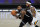 Utah Jazz's Royce O'Neale, right, defends Brooklyn Nets' Kyrie Irving (11) during the first half of an NBA basketball game Tuesday, Jan. 5, 2021, in New York. (AP Photo/Frank Franklin II)