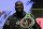 Deontay Wilder poses during a news conference for his upcoming WBC heavyweight championship boxing match against Tyson Fury, of England, Wednesday, Feb. 19, 2020, in Las Vegas. (AP Photo/Isaac Brekken)