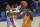 Florida guard Tre Mann (1) and Tennessee guard Davonte Gaines (0) compete for a rebound during the first half of an NCAA college basketball game Tuesday, Jan. 19. 2021, in Gainesville, Fla. (AP Photo/Matt Stamey)