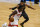 Houston Rockets guard Victor Oladipo (7) dribbles against Chicago Bulls guard Garrett Temple (17) during the second half of an NBA basketball game Monday, Jan. 18, 2021, in Chicago. (AP Photo/Matt Marton)
