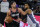 Portland Trail Blazers center Enes Kanter, left goes to the basket against Sacramento Kings forward Marvin Bagley III during the second half of an NBA basketball game in Sacramento, Calif., Saturday, Jan. 9, 2021. The Trail Blazers won 125-99. (AP Photo/Rich Pedroncelli)