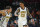 Atlanta Hawks forward John Collins (20) and guard Trae Young celebrate a point during an NBA basketball game against the Philadelphia 76ers, Saturday, March 23, 2019, in Atlanta. (AP Photo/John Amis)