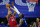 Philadelphia 76ers' Ben Simmons, left, goes up for a shot against Los Angeles Lakers' LeBron James during the second half of an NBA basketball game, Wednesday, Jan. 27, 2021, in Philadelphia. (AP Photo/Matt Slocum)