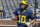 Michigan quarterback Dylan McCaffrey (10) jogs on the field during warmups before an NCAA football game against Army in Ann Arbor, Mich., Saturday, Sept. 7, 2019. (AP Photo/Tony Ding)