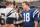Indianapolis Colts quarterback Peyton Manning, right, meets with San Diego Chargers quarterback Ryan Leaf after the Colts defeated the Charges 17-12 in Indianapolis, Sunday, Oct. 4, 1998. The win was Manning's first win in the NFL. (AP Photo/Michael Conroy)
