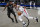 Brooklyn Nets guard Kyrie Irving (11) defends against Los Angeles Clippers guard Paul George during the second half of an NBA basketball game Tuesday, Feb. 2, 2021, in New York. (AP Photo/Kathy Willens)