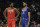 Joel Embiid of the Philadelphia 76ers and Anthony Davis of the Los Angeles Lakers talk during the second half of the NBA All-Star basketball game Sunday, Feb. 16, 2020, in Chicago. (AP Photo/Nam Huh)