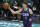 Charlotte Hornets guard LaMelo Ball passes the ball against the Milwaukee Bucks during the first half of an NBA basketball game in Charlotte, N.C., Saturday, Jan. 30, 2021. (AP Photo/Jacob Kupferman)