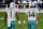 Miami Dolphins quarterbacks Tua Tagovailoa (1) and quarterback Ryan Fitzpatrick (14) walk together during warm ups before an NFL football game against the Las Vegas Raiders, Sunday, Dec. 26, 2020, in Las Vegas. (AP Photo/David Becker)