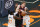 Orlando Magic forward James Ennis III (11) strips the ball from Chicago Bulls forward Lauri Markkanen, center, during the first half of an NBA basketball game, Friday, Feb. 5, 2021, in Orlando, Fla. (AP Photo/John Raoux)