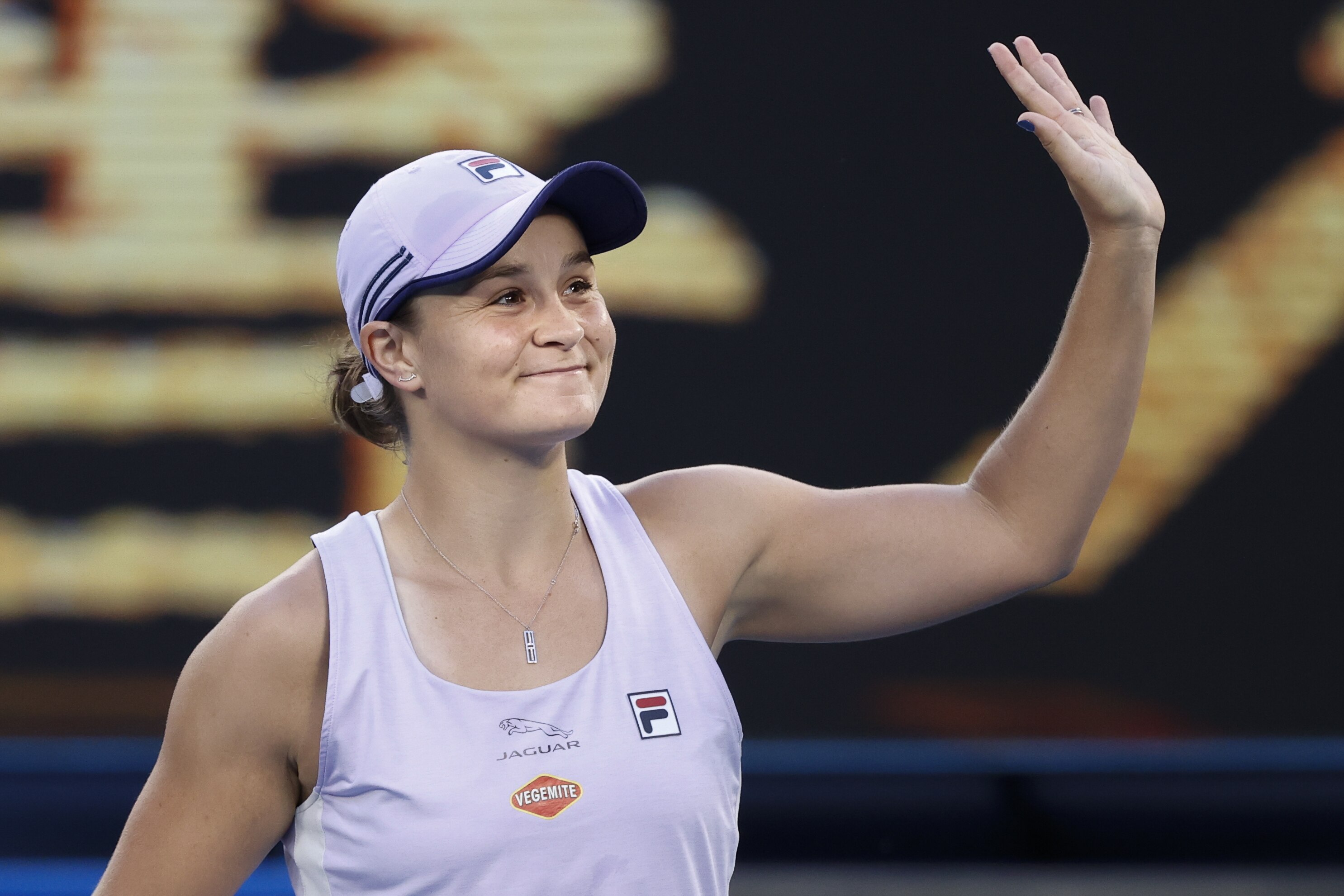 Australia's Ashleigh Barty reacts after defeating Montenegrin's Danke Kovinic during their first round match at the Australian Open tennis championship in Melbourne, Australia, Tuesday, Feb. 9, 2021. (AP Photo/Rick Rycroft)