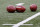 Footballs are on the field as the teams warm up before an NFL football game between the Cincinnati Bengals and the Baltimore Ravens, Sunday, Jan. 3, 2021, in Cincinnati. (AP Photo/Aaron Doster)
