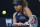 Japan's Naomi Osaka makes a backhand return to France's Caroline Garcia during their second round match at the Australian Open tennis championship in Melbourne, Australia, Wednesday, Feb. 10, 2021.(AP Photo/Rick Rycroft)