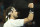 Austria's Dominic Thiem celebrates after winning his third round match against Australia's Nick Kyrgios at the Australian Open tennis championship in Melbourne, Australia, Friday, Feb. 12, 2021.(AP Photo/Hamish Blair)