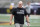 Iowa strength and conditioning coach Chris Doyle walks on the field before an NCAA college football game between Iowa and Northern Illinois, Saturday, Sept. 1, 2018, in Iowa City, Iowa. (AP Photo/Charlie Neibergall)