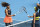 Japan's Naomi Osaka, left, is congratulated by Spain's Garbine Muguruza after winning their fourth round match at the Australian Open tennis championship in Melbourne, Australia, Sunday, Feb. 14, 2021.(AP Photo/Hamish Blair)