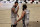 Brooklyn Nets guard Kyrie Irving (11) high fives guard James Harden (13) during the second half of an NBA basketball game against the Miami Heat, Monday, Jan. 25, 2021, in New York. (AP Photo/Adam Hunger)