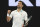 Serbia's Novak Djokovic celebrates after defeating Canada's Milos Raonic during their fourth round match at the Australian Open tennis championship in Melbourne, Australia, Monday, Feb. 15, 2021.(AP Photo/Hamish Blair)