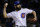 FILE - In this Wednesday, Oct. 18, 2017 file photo, Chicago Cubs starting pitcher Jake Arrieta throws during the first inning of Game 4 of baseball's National League Championship Series against the Los Angeles Dodgers in Chicago. Jake Arrieta and Wade Davis were among nine free agents who have received $17.4 million qualifying offers from their teams, Monday, Nov. 6, 2017.  (AP Photo/Nam Y. Huh, File)