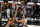 Philadelphia 76ers guard Ben Simmons (25) shoots as Utah Jazz center Rudy Gobert (27) defends in the second half during an NBA basketball game Monday, Feb. 15, 2021, in Salt Lake City. (AP Photo/Rick Bowmer)