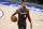 Portland Trail Blazers guard Damian Lillard (0) moves the ball up the court during the second half of an NBA basketball game in Dallas, Sunday, Feb. 14, 2021. (AP Photo/Michael Ainsworth)
