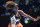Japan's Naomi Osaka hits a forehand return to United States' Serena Williams during their semifinal match at the Australian Open tennis championship in Melbourne, Australia, Thursday, Feb. 18, 2021.(AP Photo/Andy Brownbill)