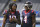 Houston Texans wide receiver DeAndre Hopkins. left, talks with quarterback Deshaun Watson before an NFL football game against the Los Angeles Chargers Sunday, Sept. 22, 2019, in Carson, Calif. (AP Photo/Mark J. Terrill)