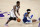 Brooklyn Nets guard Kyrie Irving, left, dribbles past Los Angeles Lakers guard Kentavious Caldwell-Pope during the first half of an NBA basketball game Thursday, Feb. 18, 2021, in Los Angeles. (AP Photo/Marcio Jose Sanchez)
