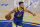 Golden State Warriors guard Stephen Curry dribbles the ball up the court against the Cleveland Cavaliers during the first half of an NBA basketball game in San Francisco, Monday, Feb. 15, 2021. (AP Photo/Jeff Chiu)