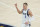 Dallas Mavericks' Kristaps Porzingis (6) reacts after hitting a shot during the second half of an NBA basketball game against the Indiana Pacers, Wednesday, Jan. 20, 2021, in Indianapolis. (AP Photo/Darron Cummings)