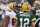 FILE - Tampa Bay Buccaneers defensive end Ndamukong Suh (93) talks with Green Bay Packers quarterback Aaron Rodgers (12) during the second half of an NFL football game in Tampa, Fla., in this Sunday, Oct. 18, 2020, file photo. Rodgers had his worst game of the season in Green Bayâ€™s 38-10 loss at Tampa Bay Back on Oct. 18, as he threw two game-changing interceptions and completed less than half his pass attempts. Rodgers gets a chance to make amends for that performance Sunday when the top-seeded Packers host the Bucs in the NFC championship game.  (AP Photo/Jeff Haynes, File)
