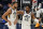 Utah Jazz's Donovan Mitchell (45) and Rudy Gobert (27) walk on the court in the second half during an NBA basketball game against the Milwaukee Bucks Friday, Feb. 12, 2021, in Salt Lake City. (AP Photo/Rick Bowmer)
