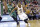 Utah Jazz guard Elijah Millsap (13) drives around Boston Celtics guard Marcus Thornton (4) in the third quarter during an NBA basketball game Monday, Jan. 26, 2015, in Salt Lake City. The Celtics won 99-90. (AP Photo/Rick Bowmer)