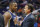 Utah Jazz head coach Quin Snyder, right, talks with Elijah Millsap during the first half of an NBA preseason basketball game against the Phoenix Suns, Friday, Oct. 9, 2015, in Phoenix. (AP Photo/Ross D. Franklin)