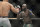 Jairzinho Rozenstruik, right, pursues Alistair Overeem during their heavyweight mixed martial arts bout at UFC Fight Night, Sunday, December 8, 2019, in Washington, D.C. Rozenstruik won via 5th round TKO. (AP Photo/Gregory Payan)