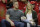 FILE - In this April 16, 2019 photo, Houston Texans' J.J. Watt, left, and his girlfriend, professional soccer player Kealia Ohai attend Game 1 of an NBA basketball first-round playoff series between the Oklahoma City Thunder and Houston Rockets in Houston. Both tweeted word of their engagement Sunday, May 26, 2019, with photos showing Watt down on one knee before Ohai along a waterfront and rocky coast with a beautiful sunset. (AP Photo/David J. Phillip, File)