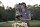 Collin Morikawa kisses the championship trophy after winning the Workday Championship golf tournament Sunday, Feb. 28, 2021, in Bradenton, Fla. (AP Photo/Phelan M. Ebenhack)