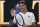 Switzerland's Roger Federer reacts after defeating Tennys Sandgren of the U.S. in their quarterfinal match at the Australian Open tennis championship in Melbourne, Australia, Tuesday, Jan. 28, 2020. (AP Photo/Lee Jin-man)